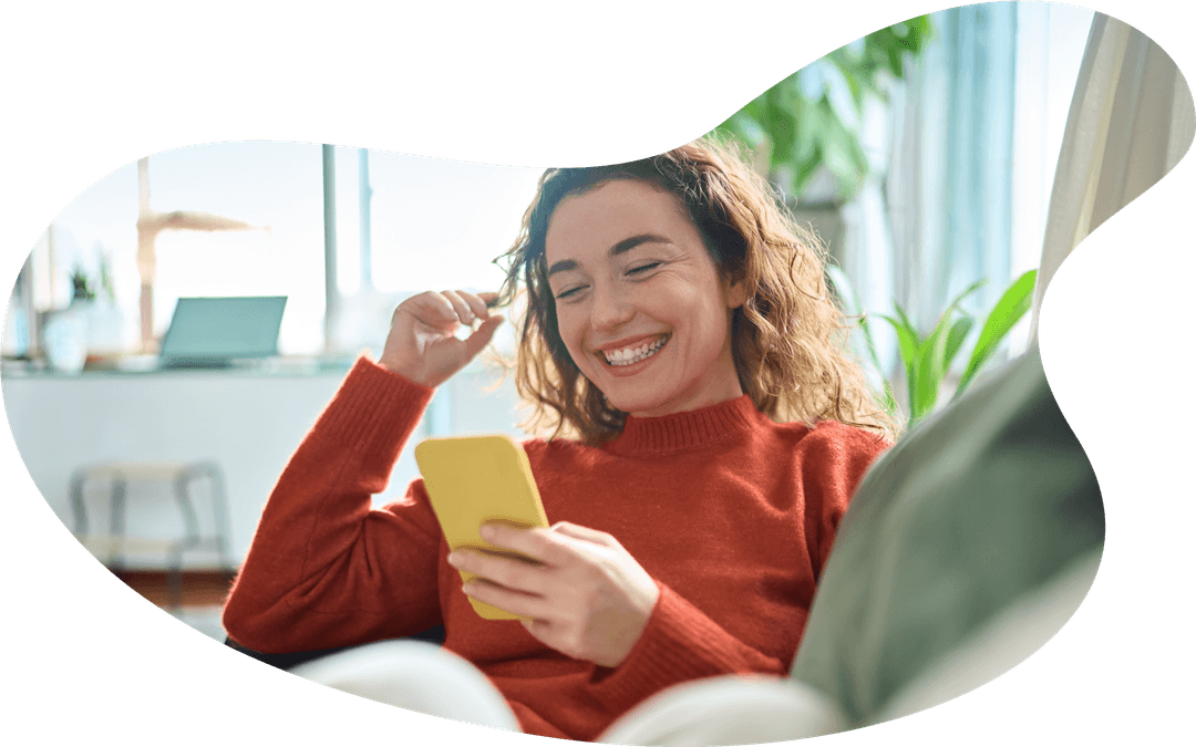 Women on phone smiling